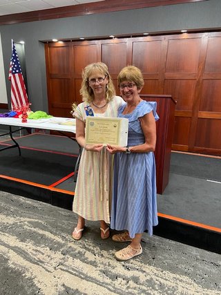 June Banquet Liana Smith receives award from Sue ODay