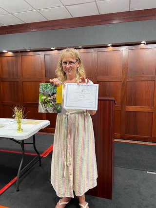 June Banquet Sue ODay won prize for photography in State Art Contest