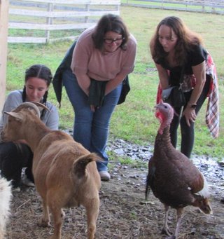 Tara with her niece and sister-in-law in a close-up visit with some of the residents