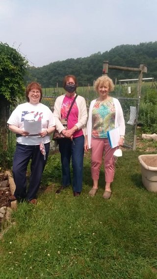 Jan Eileen and Diane inspect Pollinator garden June 2023